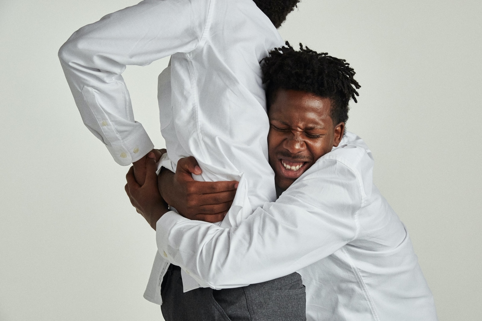 Friendship: Man hugging another man