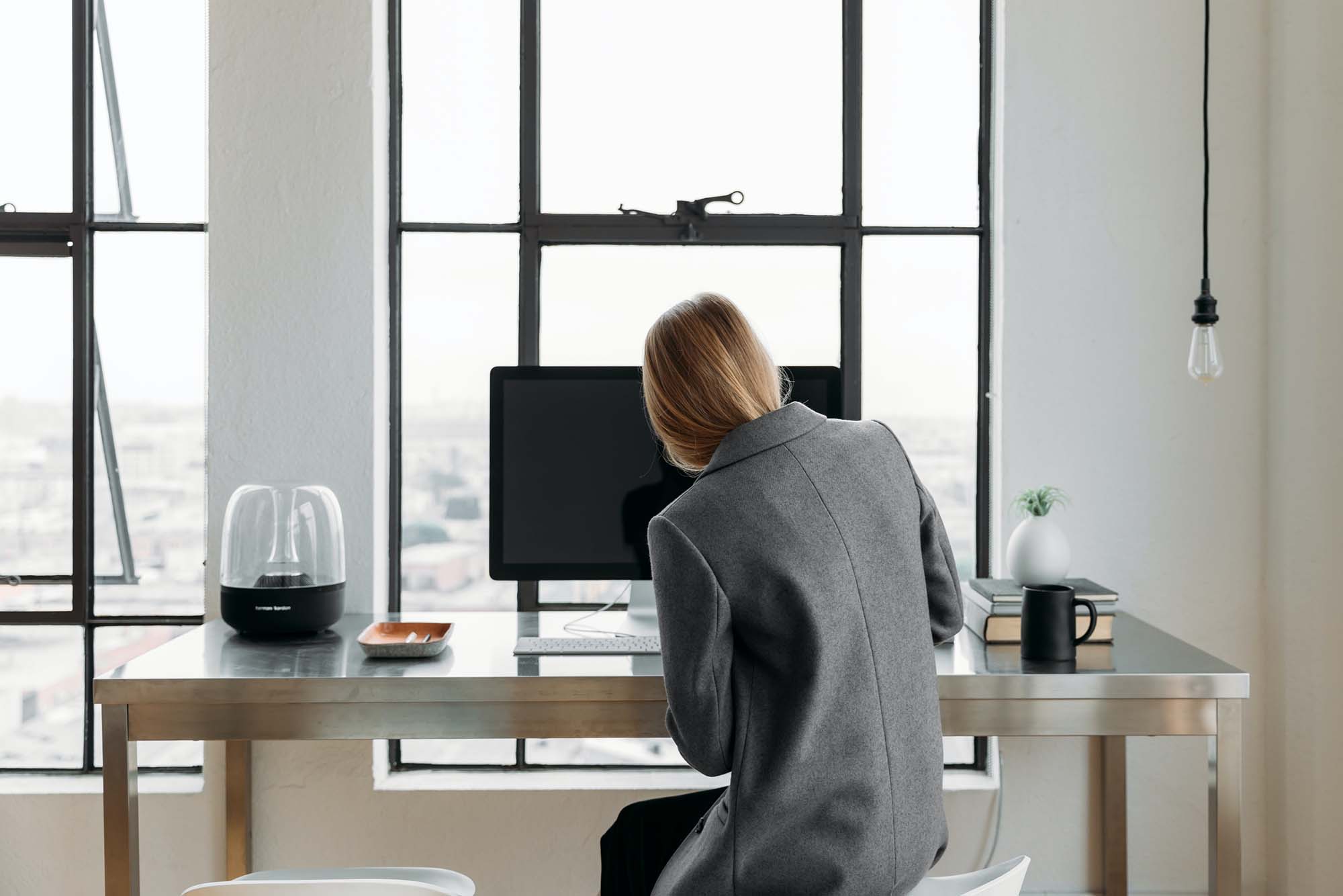 Woman sitting at her desk