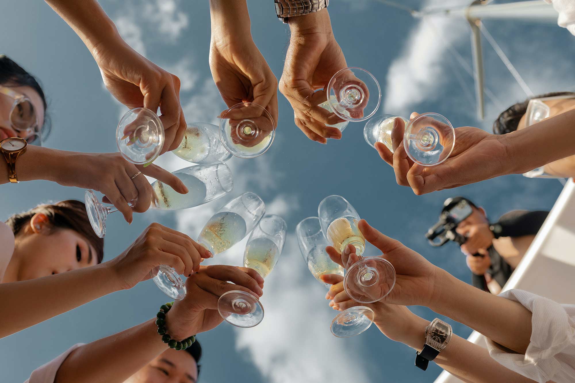 People toasting with champagne glasses